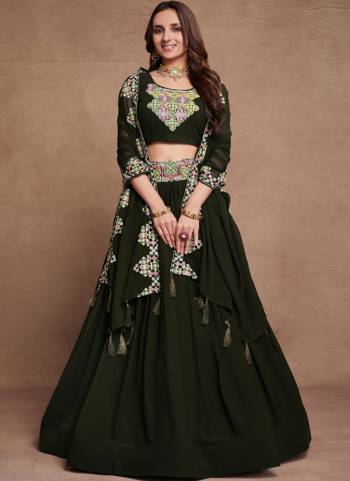 For A Designer Look,Grab These Lehenga Choli in Fine Colored.These Lehenga Are Georgette And Dupatta Are Fabricated On Georgette Pair With Georgette Blouse.Its Beautified With Blooming Color,Designer Thread,Sequance Embroidery Work.