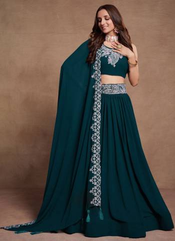 For A Designer Look,Grab These Lehenga Choli in Fine Colored.These Lehenga Are Georgette And Dupatta Are Fabricated On Georgette Pair With Georgette Blouse.Its Beautified With Blooming Color,Designer Thread,Sequance Embroidery Work.