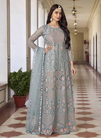 Attrective Looking These Anarkali Suit in Fine Colored Pair With Bottom And Dupatta.These Top And Dupatta Are Fabricated On Butterfly Net Pair With Japan Satin Bottom And Dull Santoon Inner.Its Beautified With Heavy Designer Embroidery Work.