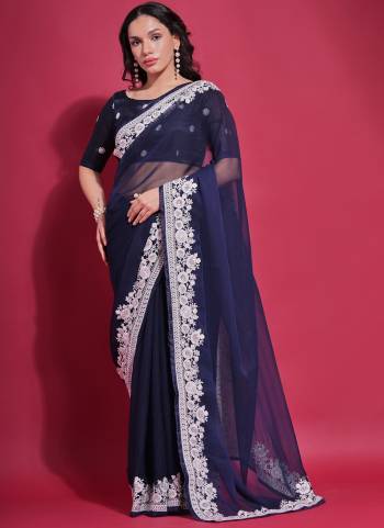 Attrective These Party Wear Saree in Fine Colored.These Saree is Fabricated On Georgette Pair With Mono Banglori Blouse.Its Beautified Designer Thread Embroidery Work.