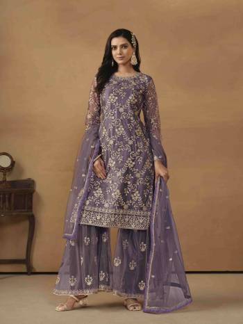 Garb These Party Wear Sharara Suit in Fine Colored Pair With Bottom And Dupatta.These Top And Dupatta Are Fabricated On Net Pair With Satin/Net Bottom.Its Beautified With Satin Inner.Its Beautified With Designer Heavy Sequance Embroidery Work.