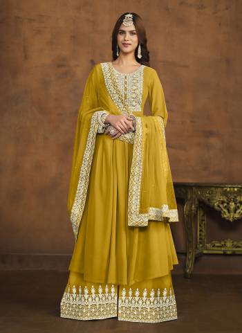 Looking These Designer Paty Wear Plazzo Suit in Fine Colored Pair With Bottom And Dupatta.These Top And Bottom Are Fabricated On Faux Georgette Pair With Net Dupatta.Its Beautified With Santoon Inner.Its Beautified With Heavy Designr Embroidery Work.