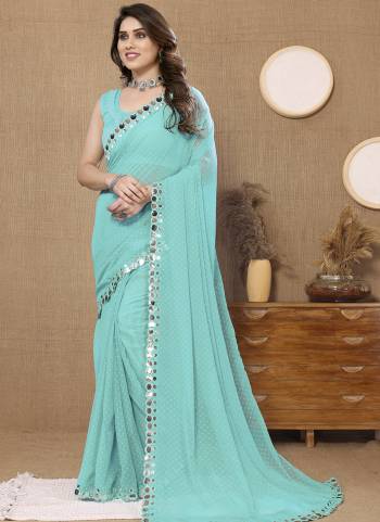 Attrective Look These Saree in Fine Colored.These Saree Are Soft Chiffon And Blouse is Mono Banglori Fabricated.Its Beautified With Wevon Butti Designer With Mirror Embroidery Work Lace Border.