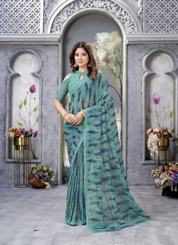 Garb These Printed Saree With Blouse in Fine Colored.These Saree And Blouse is Fabricated On Weight Less.Its Beautified With Designer Printed.