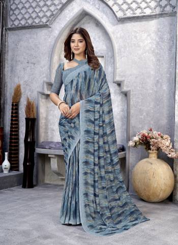 Garb These Printed Saree With Blouse in Fine Colored.These Saree And Blouse is Fabricated On Weight Less.Its Beautified With Designer Printed.