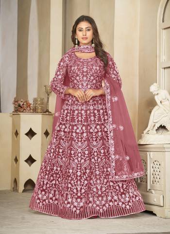 Attrective These Anarkali Suit in Fine Colored Pair With Bottom And Dupatta.These Top Are Net And Dupatta Are Fabricated On Net Pair With Santoon Bottom.Its Beautified With Heavy Designer Embroidery Work.