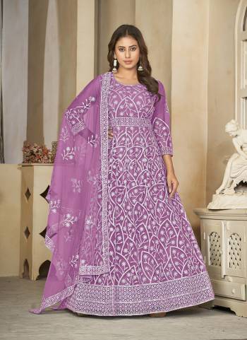 Attrective These Anarkali Suit in Fine Colored Pair With Bottom And Dupatta.These Top Are Net And Dupatta Are Fabricated On Net Pair With Santoon Bottom.Its Beautified With Heavy Designer Embroidery Work.