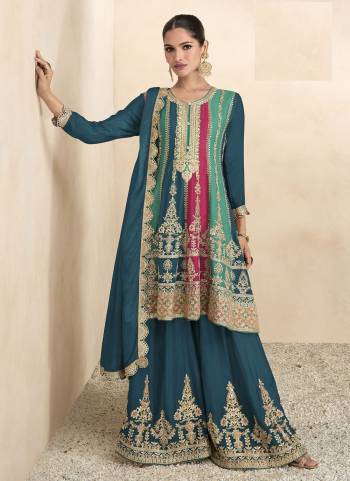 Garb These Designer Sharara Suits in Fine Colored Pair With Dupatta.These Top And Dupatta Are Fabricated On Chinon Pair With Chinon Bottom.Its Beautified With Designer Embroidery Work