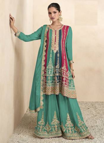 Garb These Designer Sharara Suits in Fine Colored Pair With Dupatta.These Top And Dupatta Are Fabricated On Chinon Pair With Chinon Bottom.Its Beautified With Designer Embroidery Work