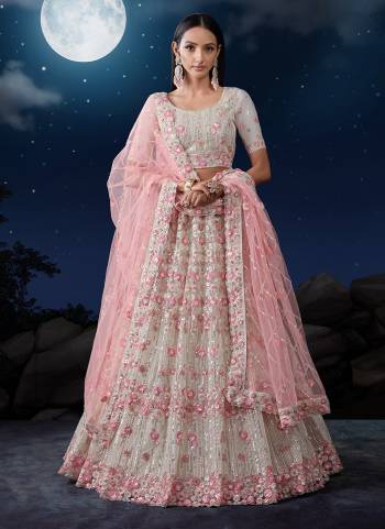 For A Designer Look,Grab These Lehenga Choli in Fine Colored.These Lehenga And Dupatta Are Fabricated On Soft Net Pair With Soft Net Blouse.Its Beautified With Heavy Designer Embroidery Work.