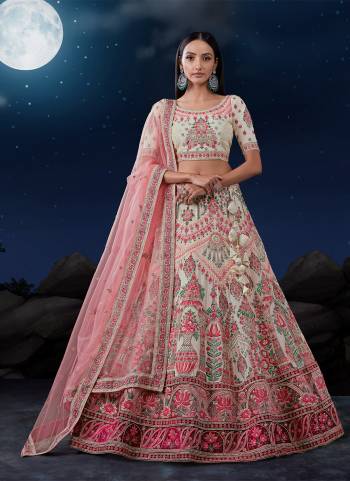 For A Designer Look,Grab These Lehenga Choli in Fine Colored.These Lehenga And Dupatta Are Fabricated On Soft Net Pair With Soft Net Blouse.Its Beautified With Heavy Designer Embroidery Work.