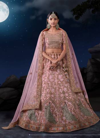 For A Designer Look,Grab These Lehenga Choli in Fine Colored.These Lehenga And Dupatta Are Fabricated On Soft Net Pair With Soft Net Blouse.Its Beautified With Heavy Designer Embroidery Work.