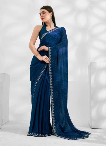 Garb These Fancy Saree in Fine Colored.These Saree Are Satin Chiffon And Blouse is Fabricated On Art Silk Pair.Its Beautified With Heavy Swarovski Work Disigner.