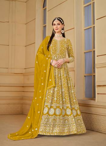 Garb These Party Wear Anarkali Suit in Fine Colored Pair With Bottom And Dupatta.These Top And Dupatta Are Fabricated On Faux Georgette Pair With Santoon Bottom.Its Beautified With Santoon Inner.Its Beautified With Designer Heavy Codding Embroidery Work.