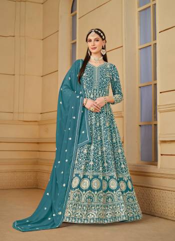 Garb These Party Wear Anarkali Suit in Fine Colored Pair With Bottom And Dupatta.These Top And Dupatta Are Fabricated On Faux Georgette Pair With Santoon Bottom.Its Beautified With Santoon Inner.Its Beautified With Designer Heavy Codding Embroidery Work.