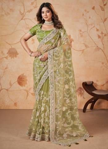 Look Attrective These Designer Party Wear Saree in Fine Colored.These Saree Are Net And Blouse Silk Slub is Fabricated.Its Beautified Heavy Designer Sequance Embroidery Work.