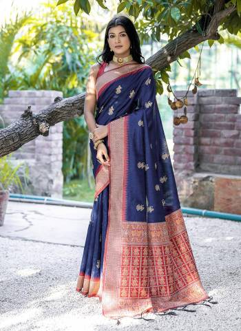 Garb These Party Wear Fancy Saree in Fine Colored.These Saree And Blouse is Fabricated On Handloom Raw Silk.Its Beautified With Handloom Weaving Designer.