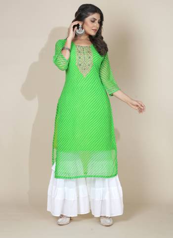 Attrective These Beautiful Looking Readymade Kurti.These Kurtis Fabricated On Georgette.Its Beautified With Designer Lahariya Printed With Gotta Work.