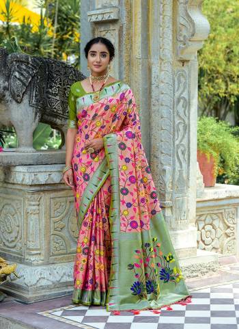 Garb These Party Wear Fancy Saree in Fine Colored.These Saree And Blouse is Fabricated On Banarasi Silk.Its Beautified With Wevon Paithani Meenakari Jacquard Designer.