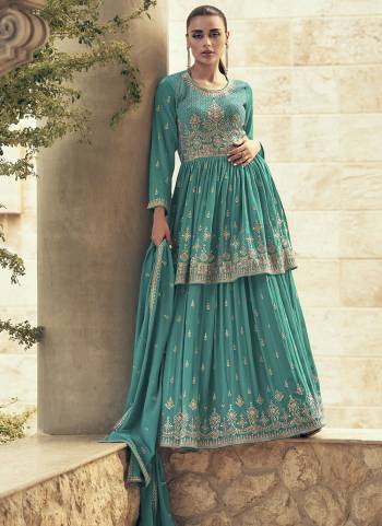 Garb These Party Wear Designer Gharara Suits in Fine Colored Pair With Dupatta.These Top And Dupatta Are Fabricated On Georgette Pair With Georgette Bottom.Its Beautified With Designer Heavy Embroidery Work