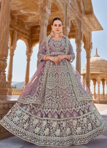 Attrective These Anarkali Suit in Fine Colored Pair With Bottom And Dupatta.These Top And Dupatta Are Fabricated On Butterfly Net Pair With Satin Bottom.Its Beautified With Designer Heavy Coding Embroidery With Stone Work.