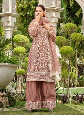 Attrective These Plazzo Suit in Fine Colored Pair With Bottom And Dupatta.These Top And Dupatta Are Fabricated On Butterfly Net Pair With Satin Bottom.Its Beautified With Designer Coding Embroidery With Stone Work.