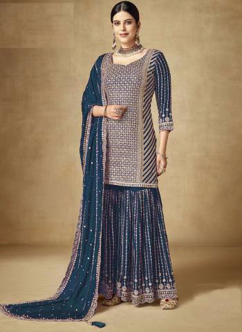 Garb These Designer Sharara Suits in Fine Colored Pair With Dupatta.These Top And Dupatta Are Fabricated On Chinon Pair With Chinon Bottom.Its Beautified With Blomming Color,Designer Sequance Embroidery Work