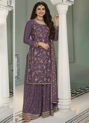 Garb These Designer Sharara Suits in Fine Colored Pair With Dupatta.These Top And Dupatta Are Fabricated On Chinon Pair With Chinon Bottom.Its Beautified With Blomming Color,Designer Thread,Sequance Embroidery Work