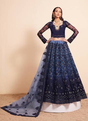 For A Designer Look,Grab These Lehenga Choli in Fine Colored.These Lehenga And Blouse Are Fabricated On Soft Net Pair With Soft Net Dupatta.Its Beautified With Designer Heavy Embroidery Work.