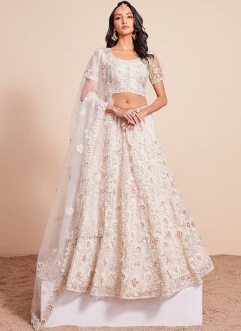For A Designer Look,Grab These Lehenga Choli in Fine Colored.These Lehenga And Blouse Are Fabricated On Soft Net Pair With Soft Net Dupatta.Its Beautified With Designer Heavy Embroidery Work.