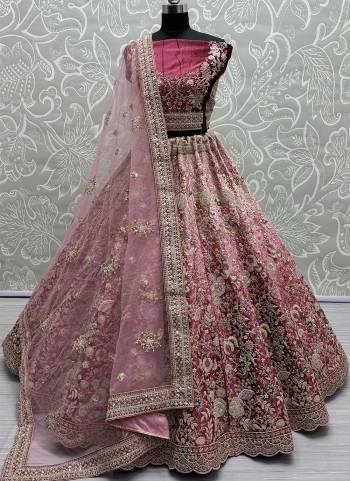 For A Fancy Designer Look,Grab These Lehenga Choli With Dupatta in Fine Colored.These Lehenga And Choli Are Velvet And Dupatta Are Fabricated On Soft Net Pair.Its Beautified With Designer Dori,Jari,Sequance,Thread Embroidery With Diamond Work.