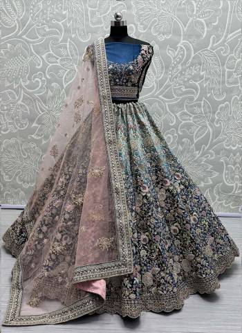 For A Fancy Designer Look,Grab These Lehenga Choli With Dupatta in Fine Colored.These Lehenga And Choli Are Velvet And Dupatta Are Fabricated On Soft Net Pair.Its Beautified With Designer Dori,Jari,Sequance,Thread Embroidery With Diamond Work.