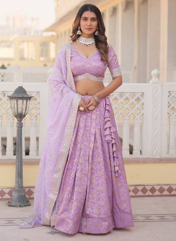 For A Designer Look,Grab These Lehenga Choli in Fine Colored.These Lehenga And Blouse Are Fabricated On Viscoce Jacquard Pair With Russion Silk Dupatta.Its Beautified With Wevon Designer With Sequance Embroidery Work.