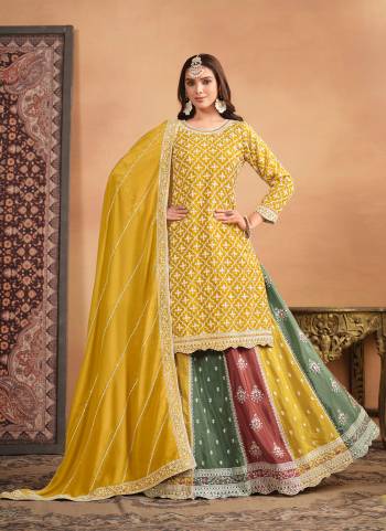 Looking These Designer Paty Wear Gharara Suit in Fine Colored Pair With Bottom And Dupatta.These Top And Dupatta Are Fabricated On Chinon Pair With Chinon Bottom.Its Beautified With Santoon Inner.Its Beautified With Heavy Designr Embroidery Work.