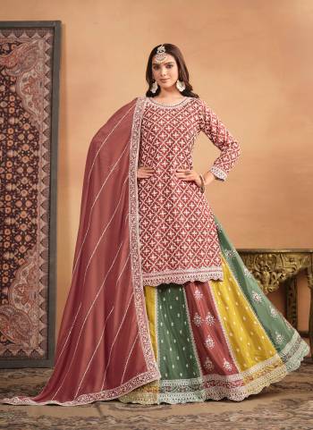 Looking These Designer Paty Wear Gharara Suit in Fine Colored Pair With Bottom And Dupatta.These Top And Dupatta Are Fabricated On Chinon Pair With Chinon Bottom.Its Beautified With Santoon Inner.Its Beautified With Heavy Designr Embroidery Work.