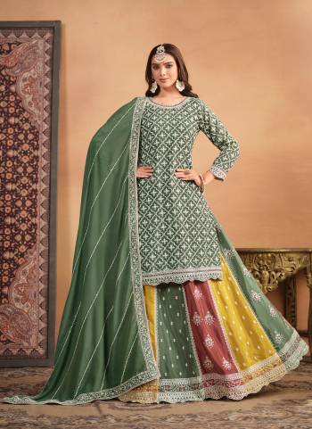 Looking These Designer Paty Wear Gharara Suit in Fine Colored Pair With Bottom And Dupatta.These Top And Dupatta Are Fabricated On Chinon Pair With Chinon Bottom.Its Beautified With Santoon Inner.Its Beautified With Heavy Designr Embroidery Work.