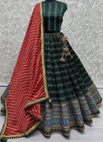 For A Fancy Designer Look,Grab These Lehenga Choli With Dupatta in Fine Colored.These Lehenga And Choli Are Chiffon Cotton And Dupatta Are Fabricated On Chiffon Pair.Its Beautified With Designer Printed,Crushed With Embroidery Work Lace Border.