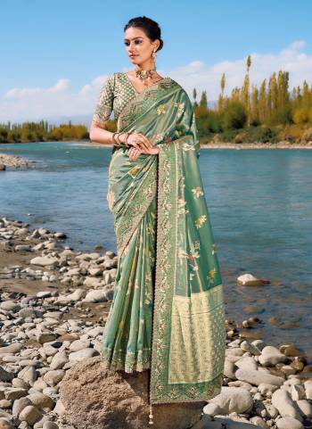 Looking These Party Wear Saree in Fine Colored.These Saree Are Banarasi Silk And Blouse is Fabricated On Banarasi Silk.Its Beautified Wevon Designer With Real Mirror,Moti,Cut Dana Work.