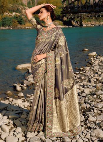 Looking These Party Wear Saree in Fine Colored.These Saree Are Banarasi Silk And Blouse is Fabricated On Banarasi Silk.Its Beautified Wevon Designer With Real Mirror,Moti,Cut Dana Work.