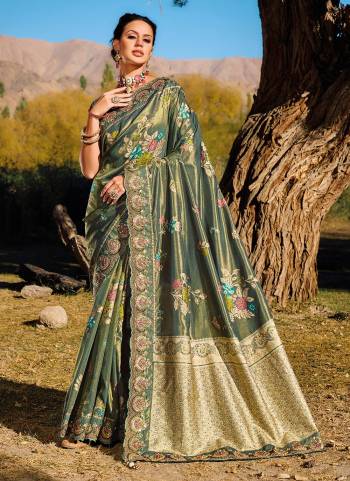 Looking These Party Wear Saree in Fine Colored.These Saree Are Banarasi Silk And Blouse is Fabricated On Banarasi Silk.Its Beautified Wevon Designer With Real Mirror,Moti,Cut Dana Work.