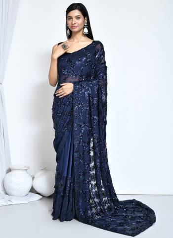 Look Attrective These Designer Party Wear Saree in Fine Colored.These Saree And Blouse Are Satin Silk is Fabricated.Its Beautified Desiger Heavy Embroidery Work.