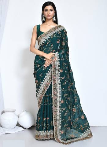 Look Attrective These Designer Party Wear Saree in Fine Colored.These Saree And Blouse Are Satin Silk is Fabricated.Its Beautified Desiger Heavy Embroidery Work.