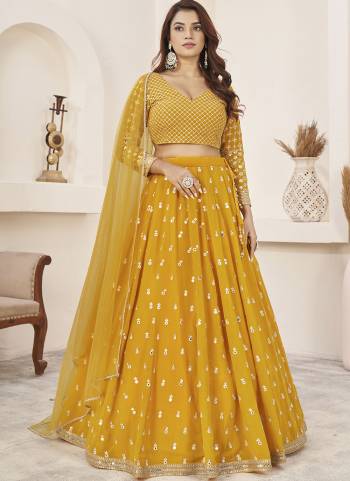 For A Designer Look,Grab These Lehenga Choli in Fine Colored.These Lehenga And Blouse Are Fabricated On Georgette Pair With Dupatta Are Soft Net.Its Beautified With Designer Jari,Sequance Embroidery Work.