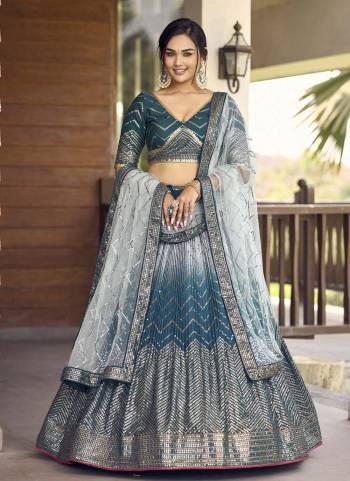 For A Designer Look,Grab These Lehenga Choli in Fine Colored.These Lehenga And Blouse Are Fabricated On Chinon Pair With Dupatta Are Soft Net.Its Beautified With Designer Thread,Sequance Embroidery Work.