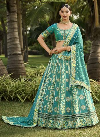 For A Designer Look,Grab These Designer Lehenga Choli in Fine Colored.These Lehenga Are Banarasi Silk And Blouse Are Fabricated On Banglori Silk Pair With Silk Dupatta.Its Beautified With Wevon Designer With Embroidery Work.