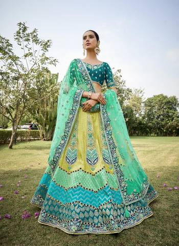 For A Designer Look,Grab These Designer Lehenga Choli in Fine Colored.These Lehenga Are Jacquard Silk And Blouse Are Fabricated On Phantom Silk Pair With Net Dupatta.Its Beautified With Designer Embroidery With Cut Work.