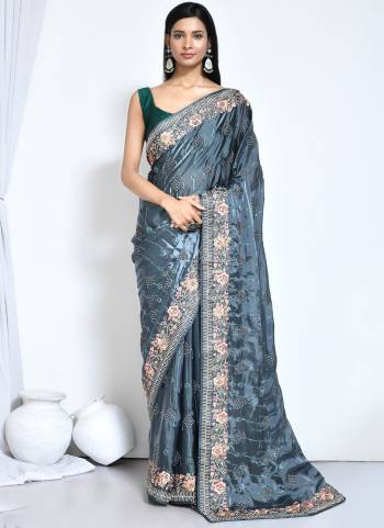 Look Attrective These Designer Party Wear Saree in Fine Colored.These Saree And Blouse Are Satin Silk is Fabricated.Its Beautified Desiger Heavy Embroidery With Stone Work.