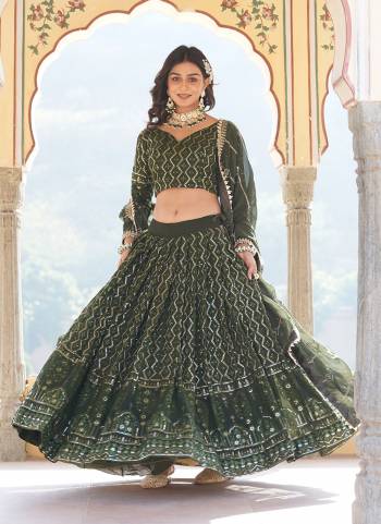 For A Designer Look,Grab These Lehenga Choli in Fine Colored.These Lehenga And Blouse Are Fabricated On Faux Georgette Pair With Faux Georgette Dupatta.Its Beautified With Designer Heavy Sequance,Thread Embroidery Work.