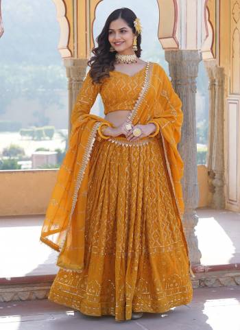 For A Designer Look,Grab These Lehenga Choli in Fine Colored.These Lehenga And Blouse Are Fabricated On Faux Georgette Pair With Faux Georgette Dupatta.Its Beautified With Designer Heavy Sequance,Thread Embroidery Work.