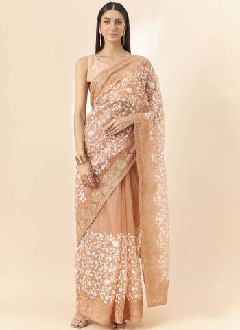 Look Attrective These Designer Party Wear Saree in Fine Colored.These Saree Are Organza And Blouse Art Silk is Fabricated.Its Beautified Desiger Floral Embroidery Work.